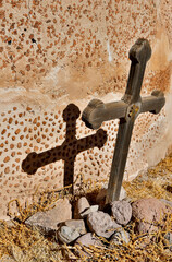 USA, Arizona. La Mission San Jose de Tumacacori and cross with its shadow