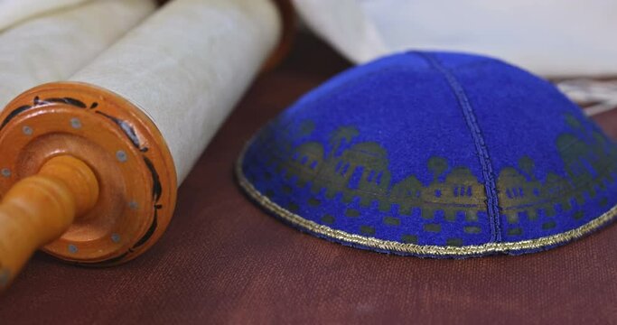 Prayer attributes Jewish symbol of Torah, shofar horn shawl tallit, and other symbols associated with prayer