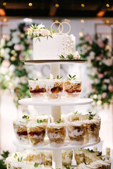 Obraz na płótnie Canvas trifles on a stand at a wedding red velvet and chocolate