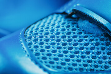 Blue highway cycling shoes on a blue background
