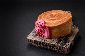 Round puff pastry croissant with raspberry filling or new york roll