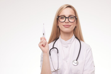 doctor holding an electronic thermometer with a high temperature on a white background