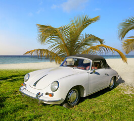 Beautiful German classic sports car, on the beach. - 595114357