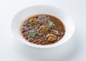 lobio soup in a white plate on a white background