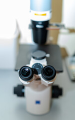 Microscope for researching. Scientific equipment.