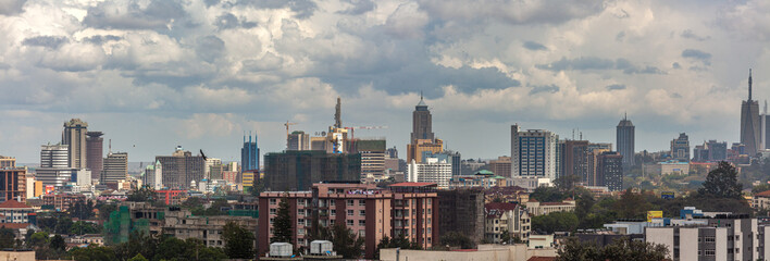 Vibrant Nairobi city center - bustling streets, iconic buildings, and the famous Kenyatta Avenue. A...