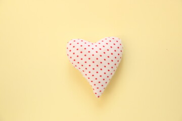 Heart on a yellow background. Holiday background.