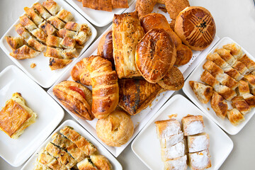 Turkish pastry product , tasty pogaca. Turkish Pastries; pogaca, borek, acma, ay coregi at patisserie showcase.
