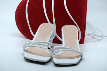 White summer shoes on a white background