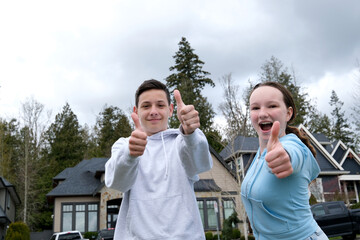 ad banner thumbs up new house car purchase sale children teenagers thumbs up laughing show in frame live in private sector credit real estate installment banking system social assistance house keys