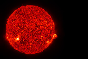 The sun from outer space on a dark background. Elements of this image furnished NASA.