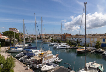 Fototapeta na wymiar View over Port Grimaud marina in France in spring with yachts and sailing boats