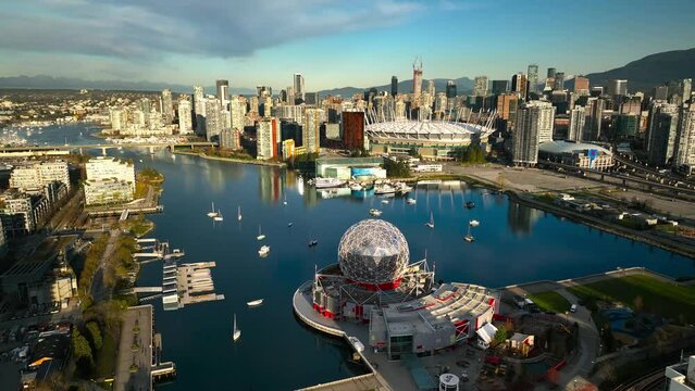 Vancouver city centre at false creek with B.C. Place and Science World with skyline and skyscrapers in background