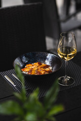 Stylish serving of food in the restaurant. Serving. Waiter