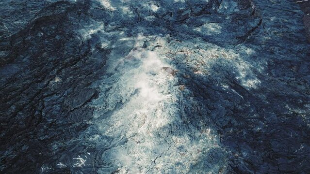 Aerial Leilani Lava Flows. 2018 Kilauea Eruption Drone on Big Island, Hawaii islands, USA tourism destination. Scenic view of burned lands covered by black frozen lava after Kilauea volcano eruption 