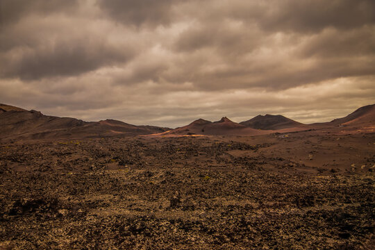 Amazing panoramic landscape of volcano in Timanfaya national park. Popular touristic in Lanzarote island Canary islans Spain. Artistic picture. Travel concept