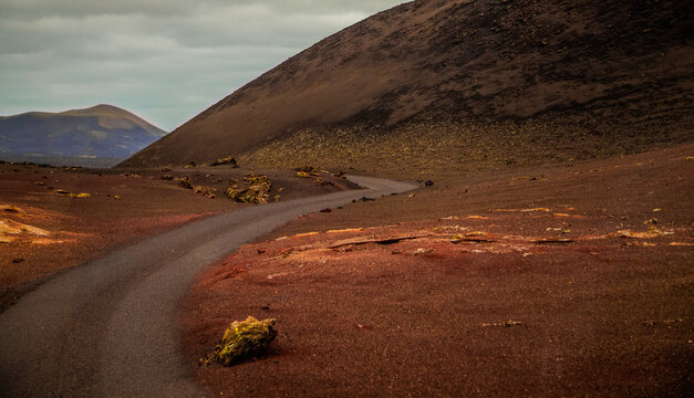 Amazing panoramic landscape of volcano in Timanfaya national park. Popular touristic in Lanzarote island Canary islans Spain. Artistic picture. Travel concept