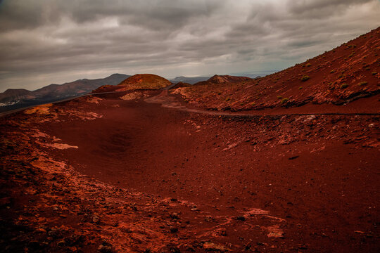 Amazing panoramic landscape of volcano in Timanfaya national park. Popular touristic in Lanzarote island Canary islans Spain. Artistic picture. Travel concept © Elena