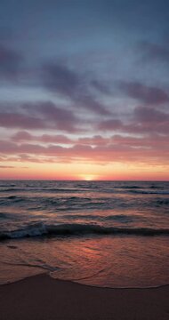 Tropical color sea sunrise over ocean beach and flying birds 4k vertical video