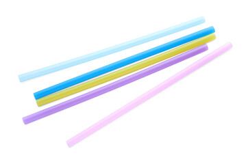 Color plastic cocktail tubes on white background