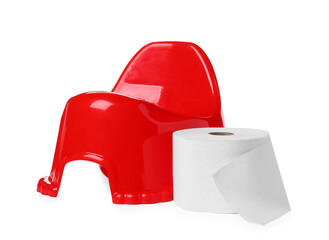 Red baby potty and toilet paper on white background