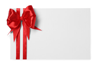 Blank gift card with red bow isolated on white, top view