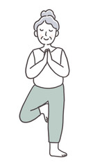 ヨガを楽しむシニア女性