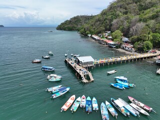 Tambor is a small boat pier located in Costa Rica, known for its calm waters and picturesque views. It serves as a popular departure point for fishing and diving excursions.