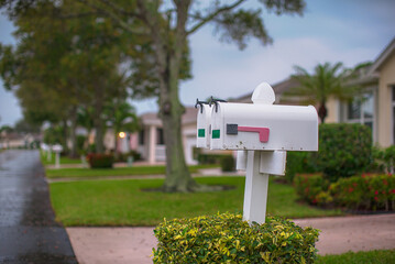 Mailboxes by side of a road in a private Community