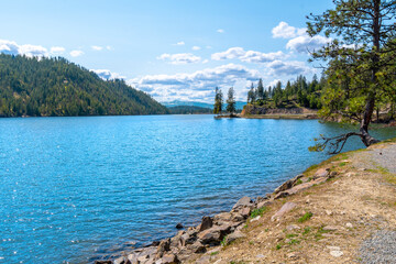 Spring view of the Fernan Lake Natural area a small, shallow lake in the rural mountain community of Coeur d'Alene, Idaho USA.	