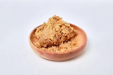 fried chicken in wooden bowl on white background