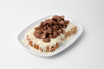 toasted bread topped with cheese slices and cereal