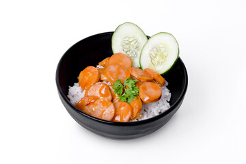 Japanese food, sausages with rice in black bowl on white background