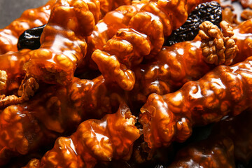 Delicious churchkhela as background, closeup