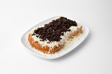 toasted bread topped with grated cheese and oreo