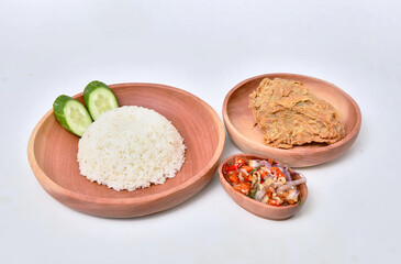 fried chicken and chilli sauce in wooden bowl on white background