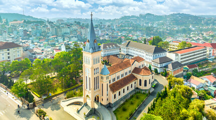 Aerial view outside Cathedral chicken in Da Lat, Vietnam on a morning. Old French architecture attracts parishioners to pray for peace at the weekend