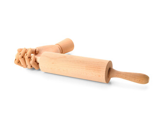 Wooden hand with rolling pin isolated on white background