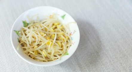 Vibrant and colorful bibimbap bowl filled with fresh and healthy vegetables, symbolizing a nutritious meal and the importance of a balanced diet for overall well-being