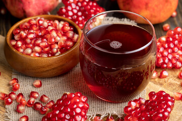 Sweet and sour pomegranate juice in a transparent glass