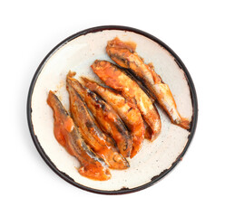 Plate with canned fish in tomato sauce isolated on white background