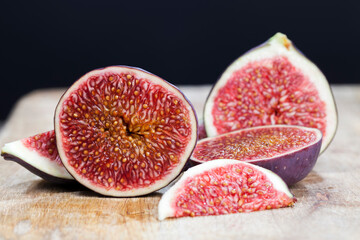 sliced ripe fresh purple figs, close up