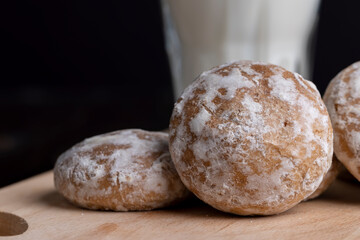 Powdered sugar gingerbread on the table