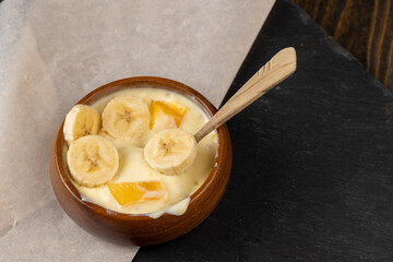 natural yogurt with pieces of fruit and banana flavor