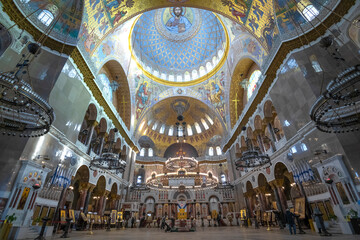 Fototapeta na wymiar The interior of the old Naval Cathedral of St. Nicholas the Wonderworker shot with a wide angle lens, Kronstadt