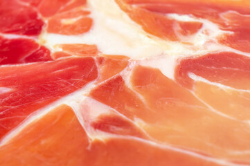 Texture of fresh jamon piece. Close up.