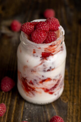 Fresh milk yogurt with whole fresh raspberries