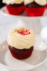 Red Velvet Cupcakes with White Chocolate Ganache Frosting