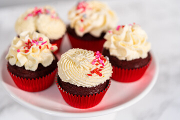 Red Velvet Cupcakes with White Chocolate Ganache Frosting