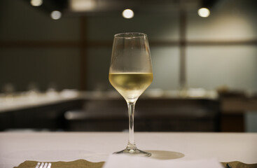 refinement and indulgence, a fancy wine glass in a restaurant represents a celebration of taste, culture, and socializing. It evokes feelings of luxury, pleasure, and conviviality